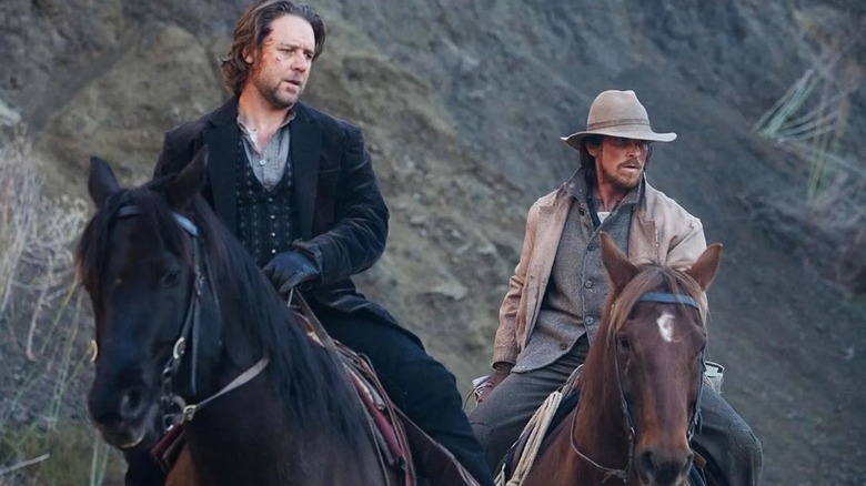 Russell Crowe (Ben Wade) and Christian Bale (Dan Evans) on horseback in 3:10 to Yuma