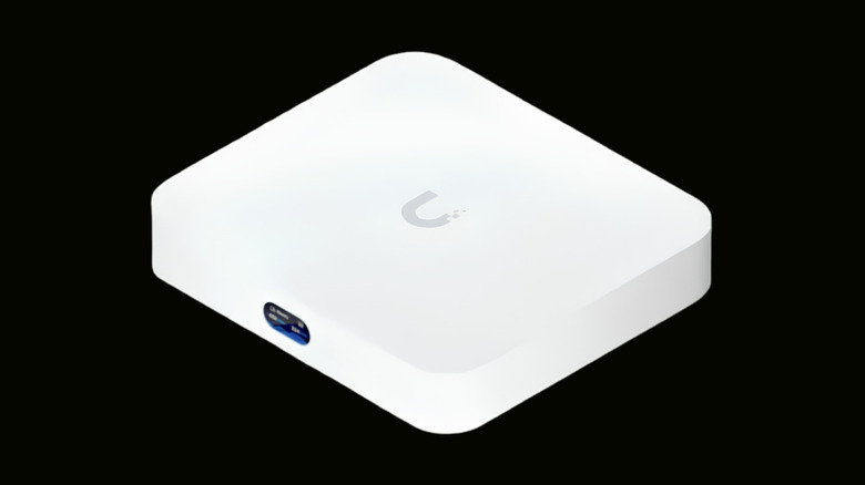 Ubiquiti UniFi UCG-Ultra Cloud Gateway Ultra Broadband Router on a black background