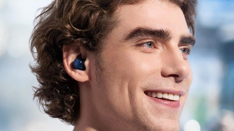 A man wearing the Soundcore Space A40.
