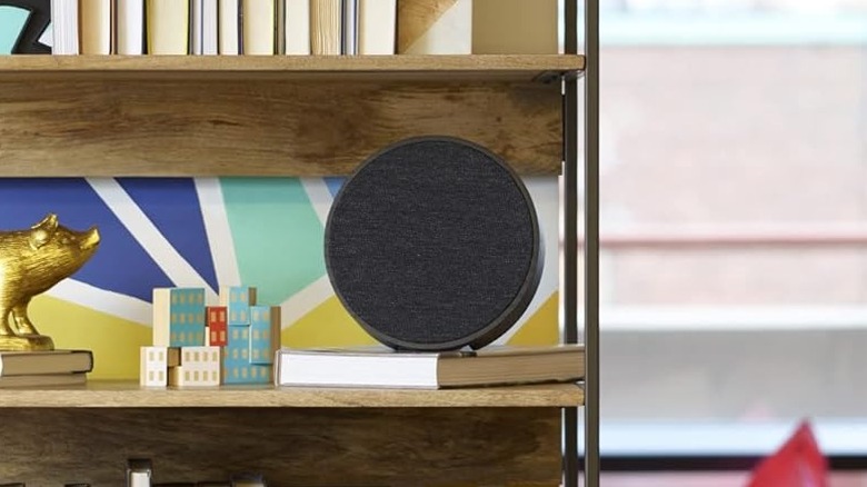 The Tivoli Audio Sphera set up on a bookshelf.