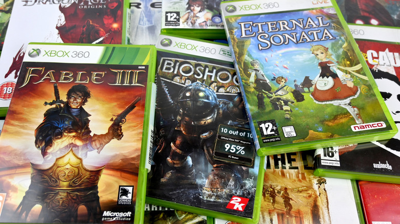 Assortment of Xbox 360 games including Fable 3, Bioshock, and Eternal Sonata