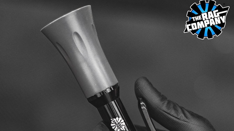 A person holding up the Ultra Air Blaster Mini nozzle