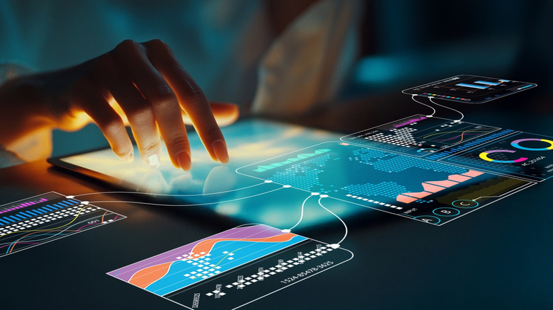 Hand using high-tech tablet