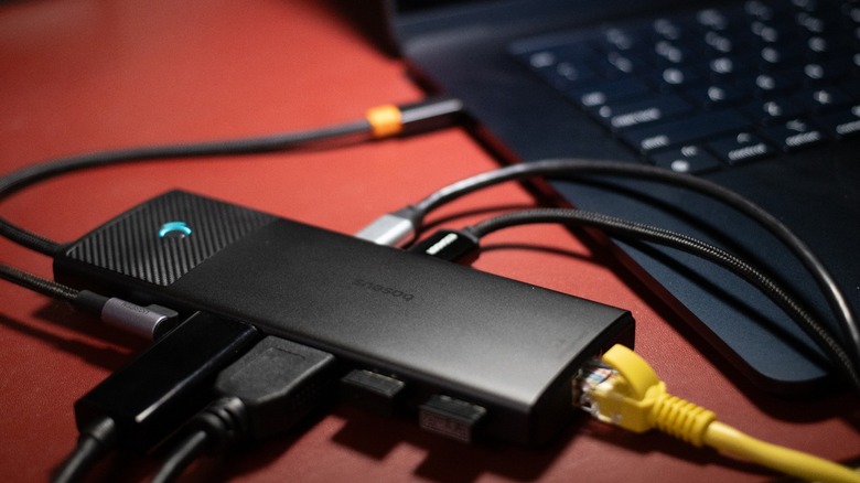 the Baseus Metal Gleam II 10-in-1 USB-C Hub attached to a MacBook Air