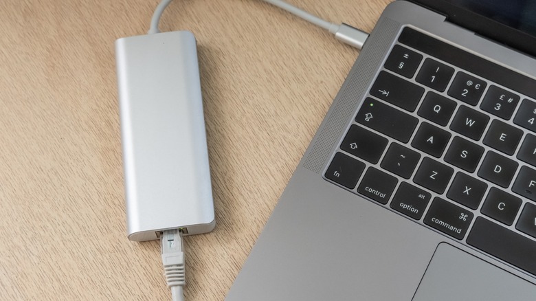 a USB-C hub attached to a MacBook