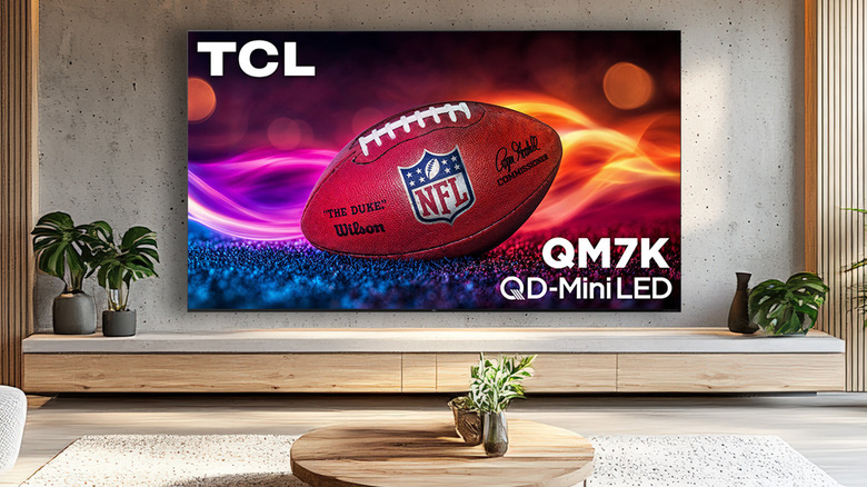 A TCL television showing a football