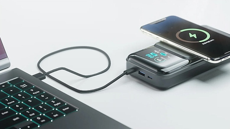 Smartphone connected to a wireless power bank.