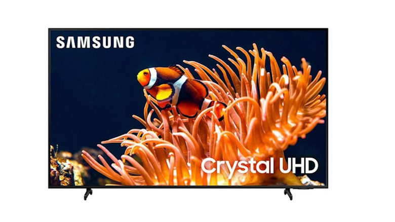 Samsung 85-inch smart television with clown fish in coral, logos on the top left and bottom right