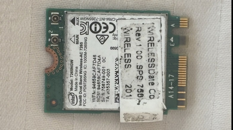 An M.2 Bluetooth and Wi-Fi card removed from a laptop or PC.