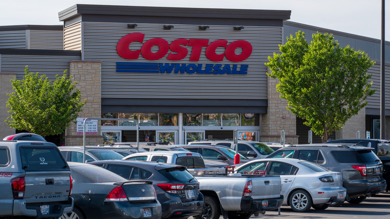 Exterior view of a Costco Wholesale retail warehouse featuring the company's logo