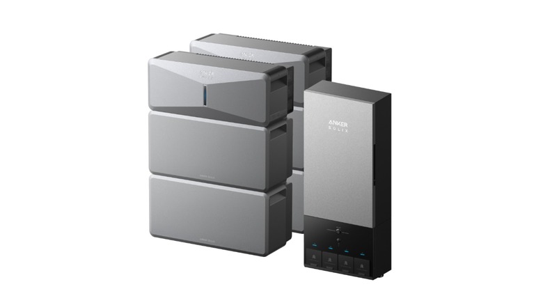 the Anker Solix E10 whole-home backup system showing two power inverter and battery modules with a Power Dock automatic transfer switch