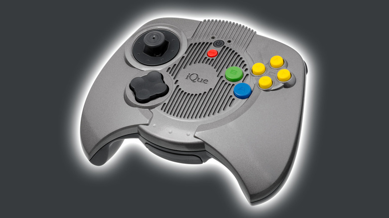 iQue Player on a grey background