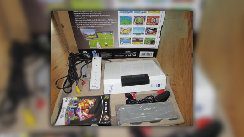 Sports Vii in its box with accessories