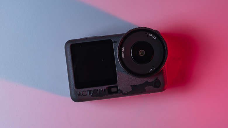 The Osmo Action 6 camera with red light flashing on it