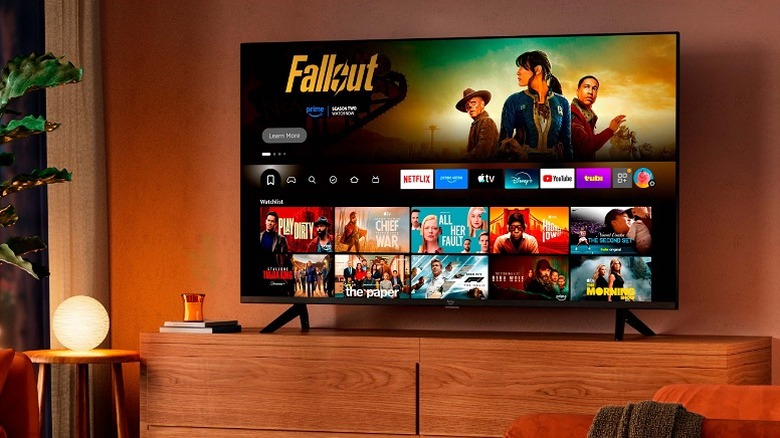 A TV screen displaying multiple shows and streaming platforms with Fallout in the header.
