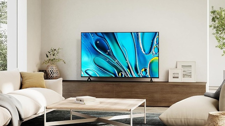 Smart TV placed on a living room TV table.