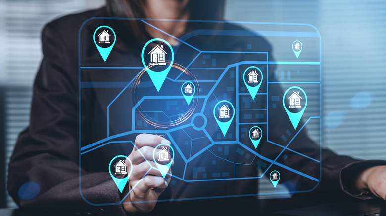 Woman interacting with futuristic digital map