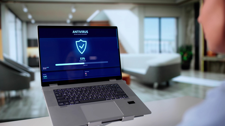 An antivirus working on a laptop