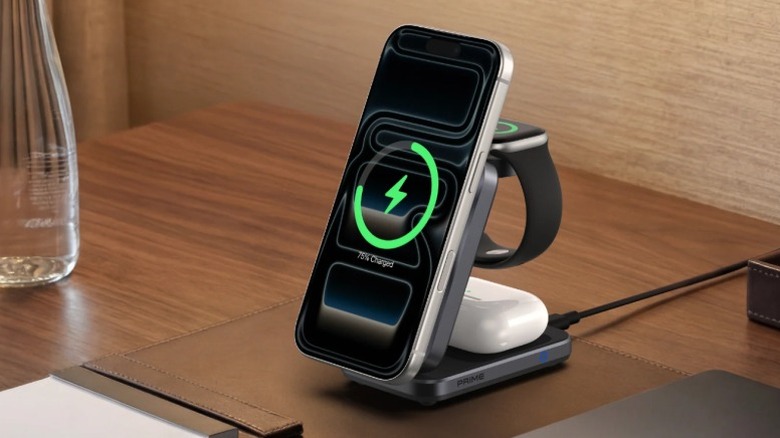 The Anker Prime 25W MagSafe charger sitting on a table charging an iPhone, Apple Watch, and AirPods.