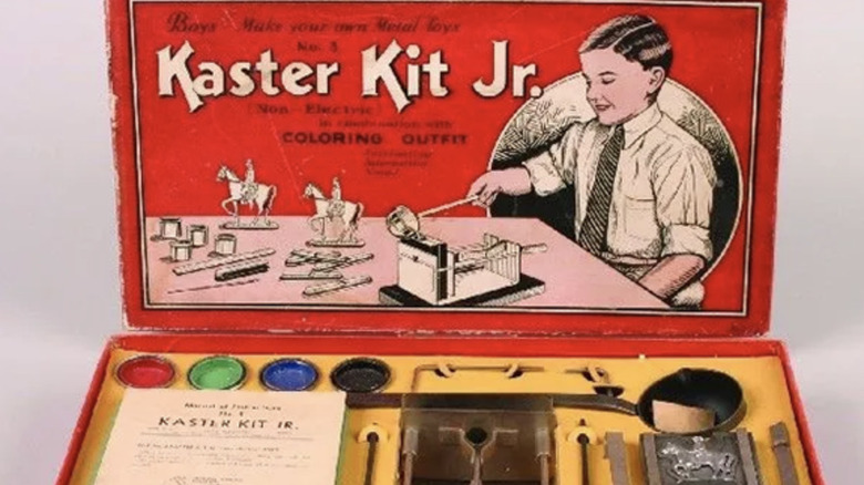 A complete Gilbert Kaster Kit Jr. metal molder set in front of white background