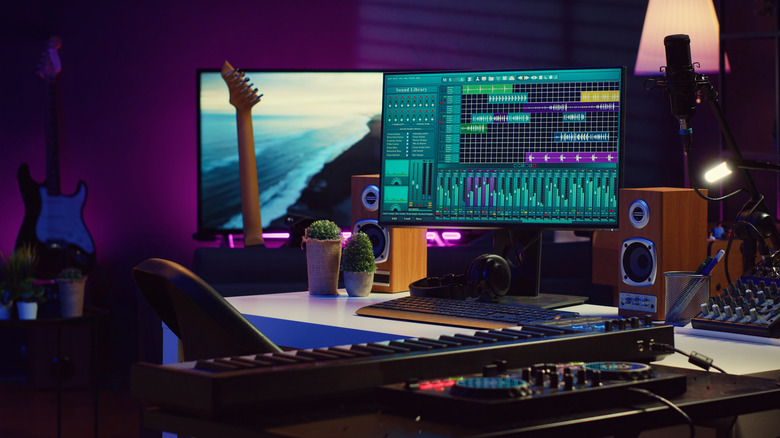 A DAW application running on a PC with multiple audio equipment plugged in