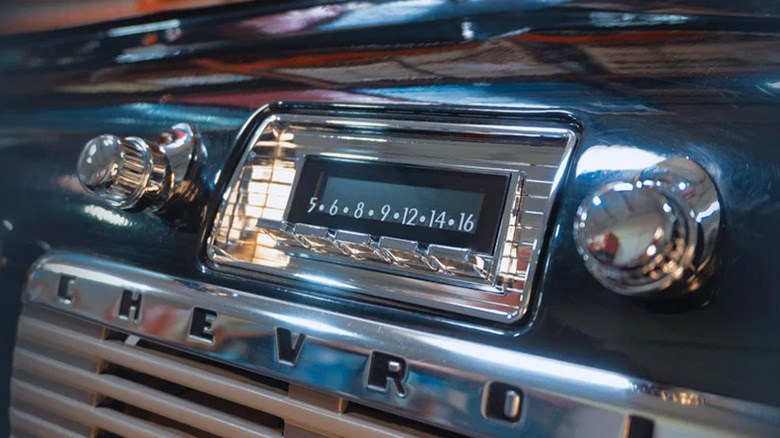 A classic car stereo in a Chevrolet.