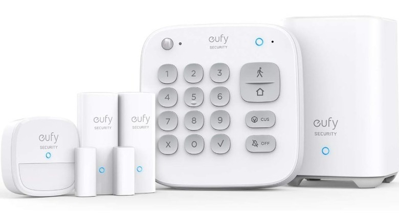 A product render of the Eufy Home Alarm Kit that consists of a base station, keypad, and entry and motion sensors.