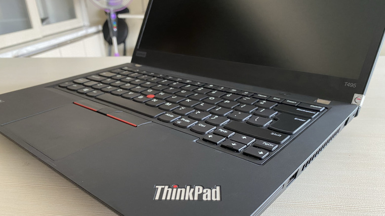 A close-up shot of a Lenovo ThinkPad laptop.
