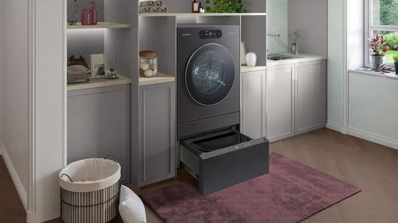 An LG combo washer and dryer in a stylish laundry room.