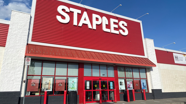 The front entrance of a Staples office supply store.