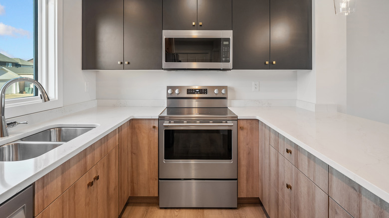 A microwave oven and a wall oven in the kitchen.