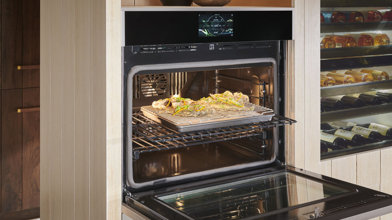 Baking using the Monogram Minimalist Collection ZTS90DSSNSS electric wall oven.