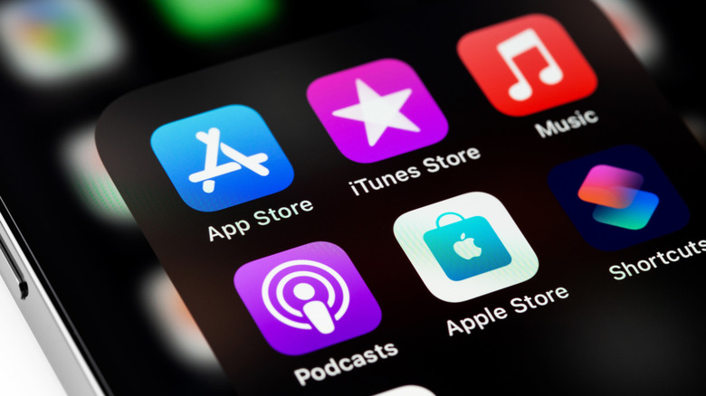Apps on an iPhone screen, including Apple Podcasts and Apple Music.