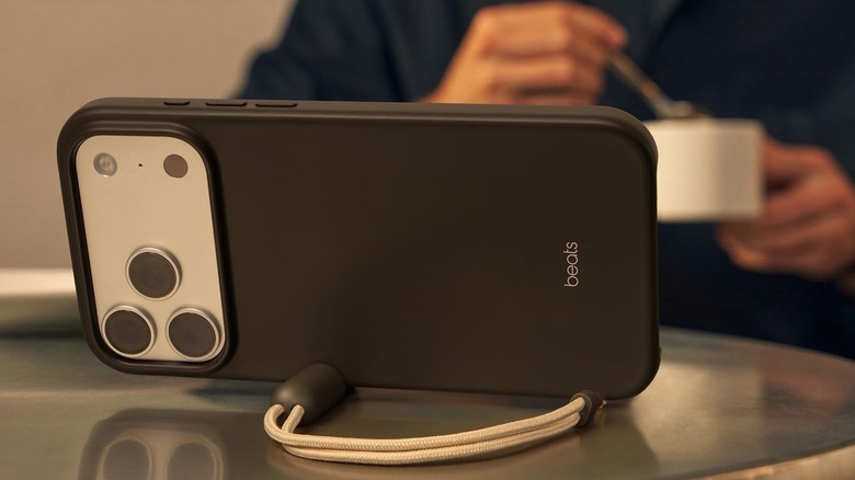 iPhone Beats Pro Max Kickstand case with the stand in use