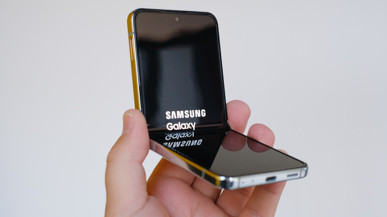 Samsung Galaxy Z Flip 5 in unique configuration in someone's hand.