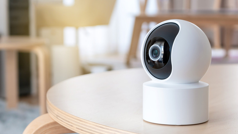 A smart security camera placed on a table