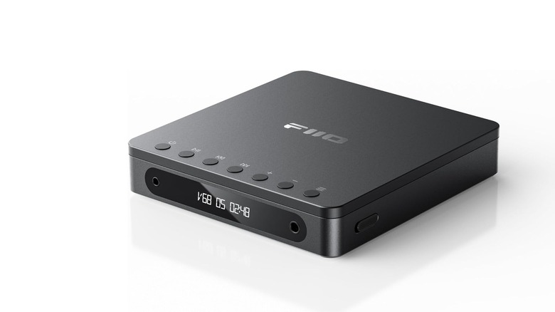 A compact external CD player on a white background.