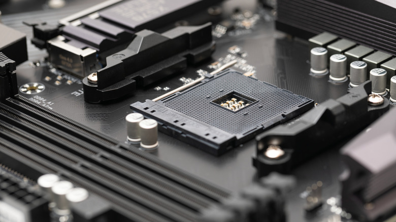 Close-up of an empty CPU socket on a desktop motherboard.