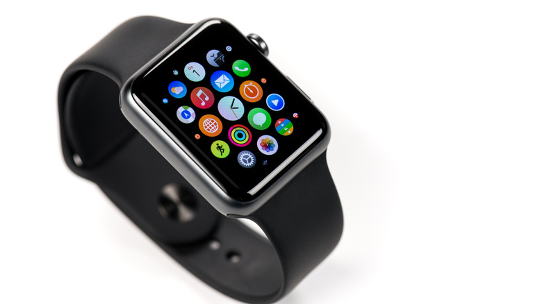 An Apple Watch lying diagonally on a white background.