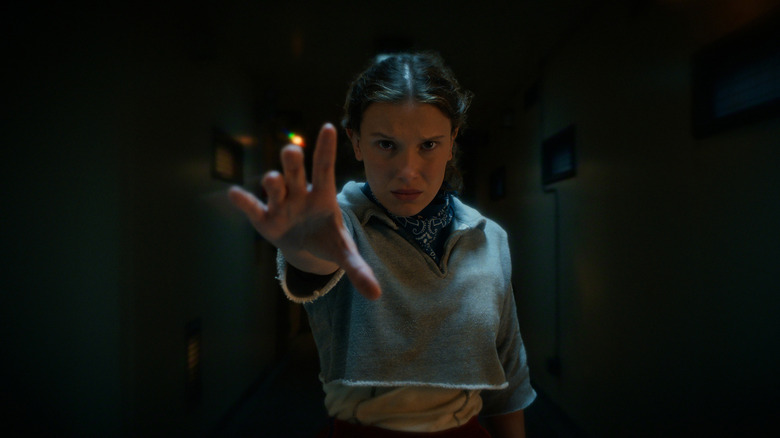 Eleven holding out her hand to use her powers