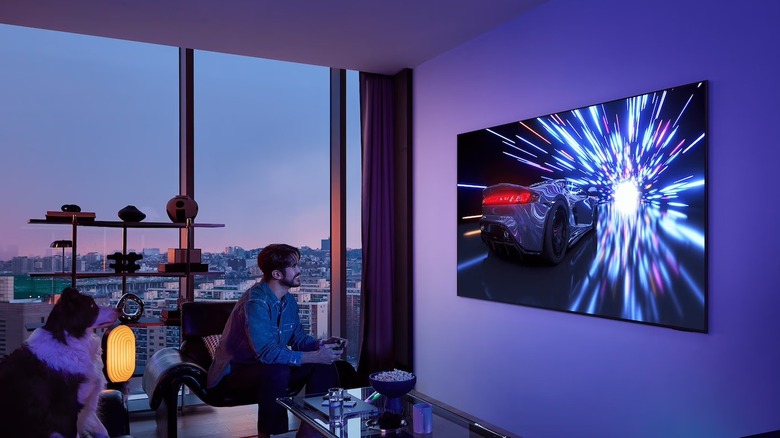 People gaming on a TV