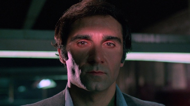 A close-up shot of Lieutenant Peter J. Nicholas (Tony Lo Bianco) in "God Told Me To."