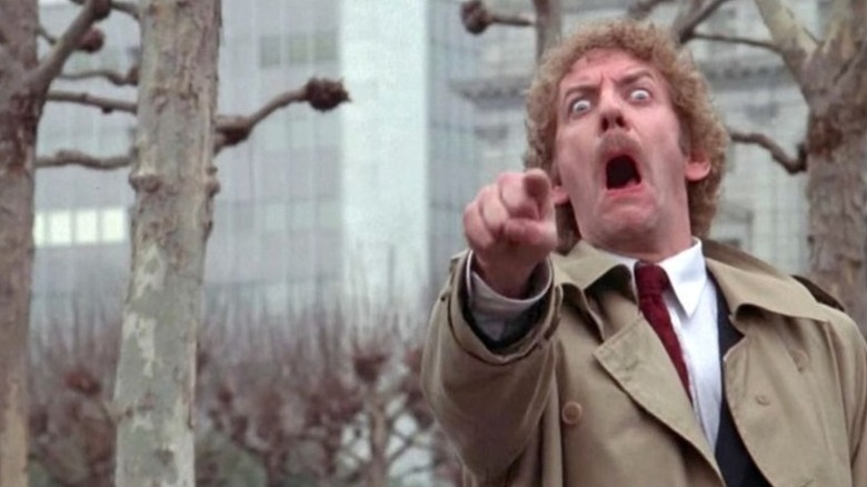 Matthew (Donald Sutherland) pointing in "Invasion of the Body Snatchers."