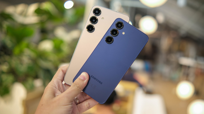 The Galaxy S25 and 25 Plus models in hand.