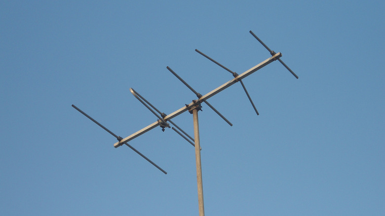 A TV broadcast antenna against a sky as a background