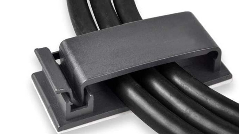 The Soulwit Cable Management Clip holding three cables.