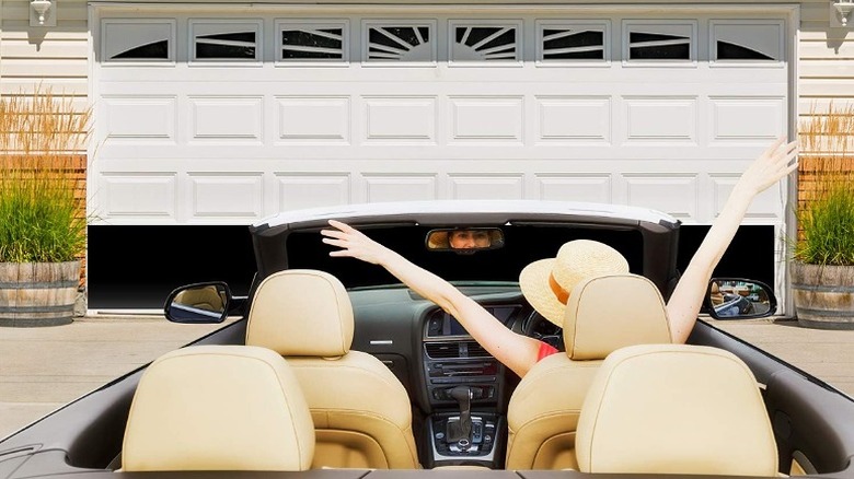 Woman driving her car inside a garage.