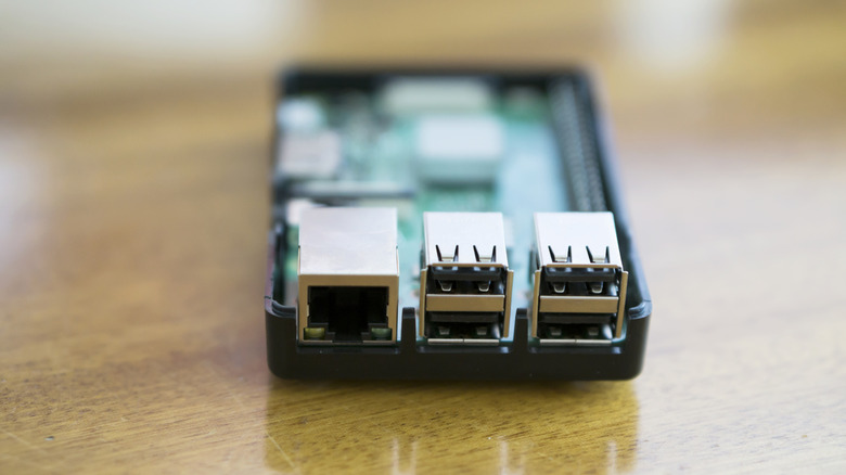 A close up of the USB ports on a Raspberry Pi microcontroller.