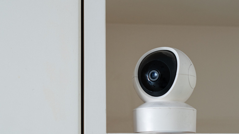 security camera placed on a shelf