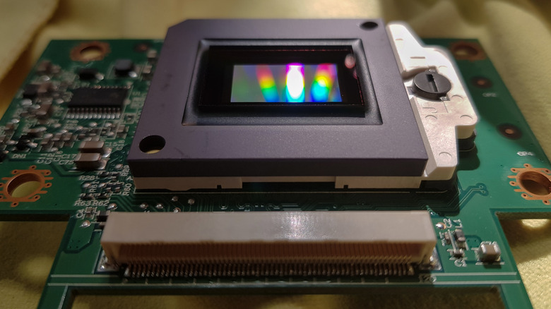 Exposed Digital Micromirror Device from a projector on a workstation